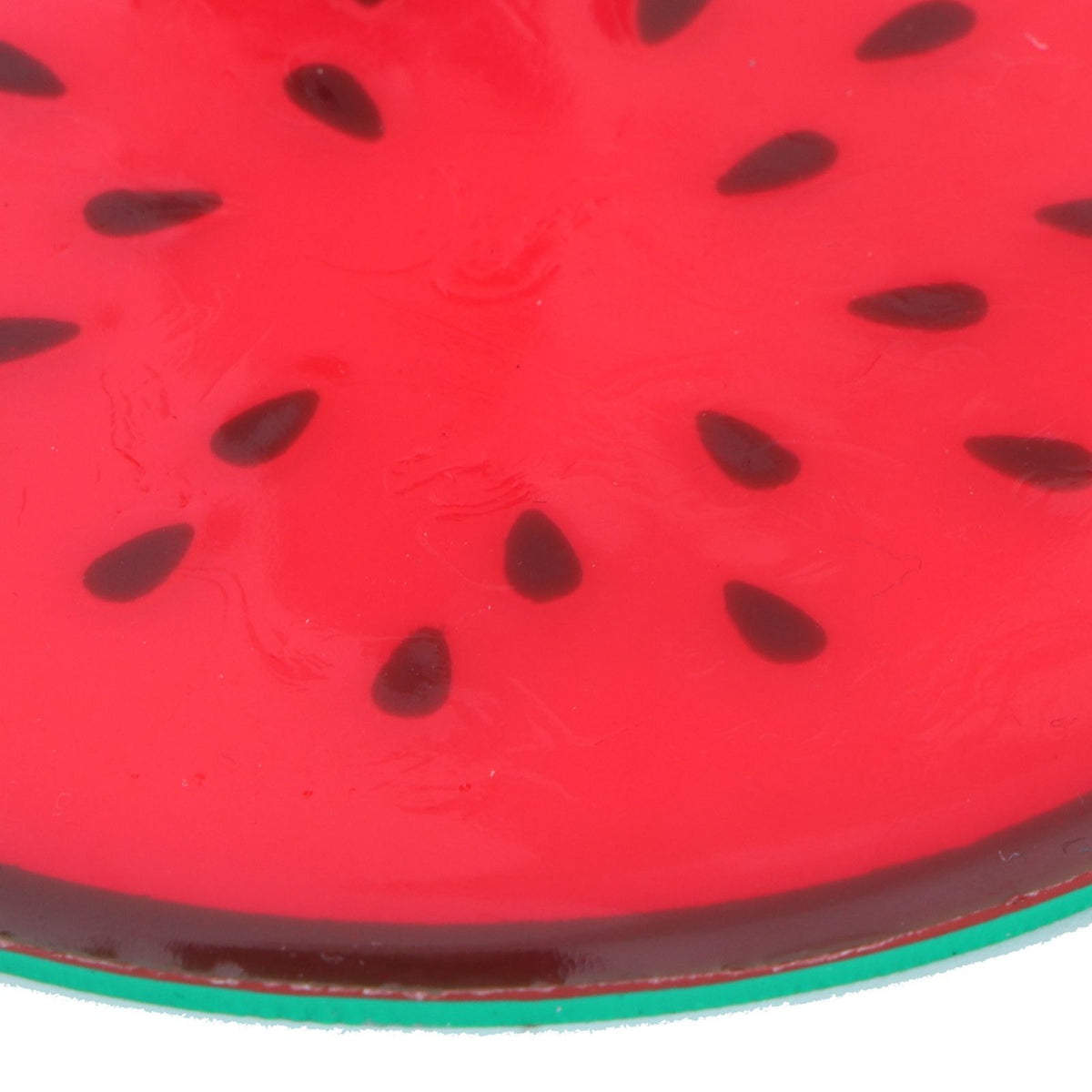 Watermelon-shaped silicone coaster for drinks, featuring a playful fruit design, suitable as a kitchen placemat or cup holder.
