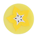 Carambola-shaped silicone coaster and placemat for drinks, designed for kids and babies, featuring vibrant fruit shape and kitchen use.