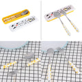 Set of 2 stainless steel baby flatware including knife, fork, and spoon with yellow handles in a box, suitable for children.