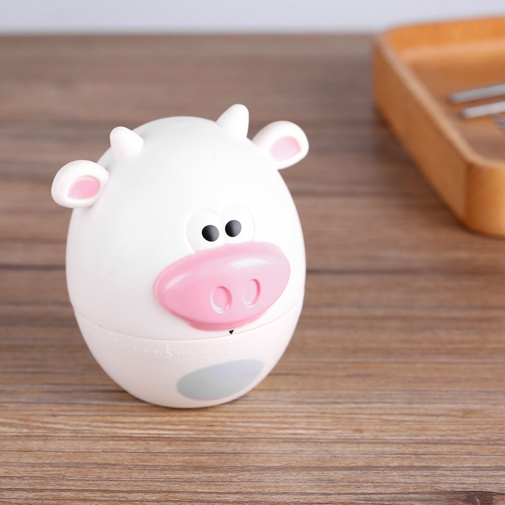 Cute cartoon mechanical kitchen timer showing 55-minute setting, designed for pretend play in kids' cooking and toy kitchen setups.