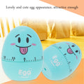 Blue plastic cartoon egg kitchen timer with mechanical alarm, 55-minute manual countdown, designed for cooking and kitchen use.