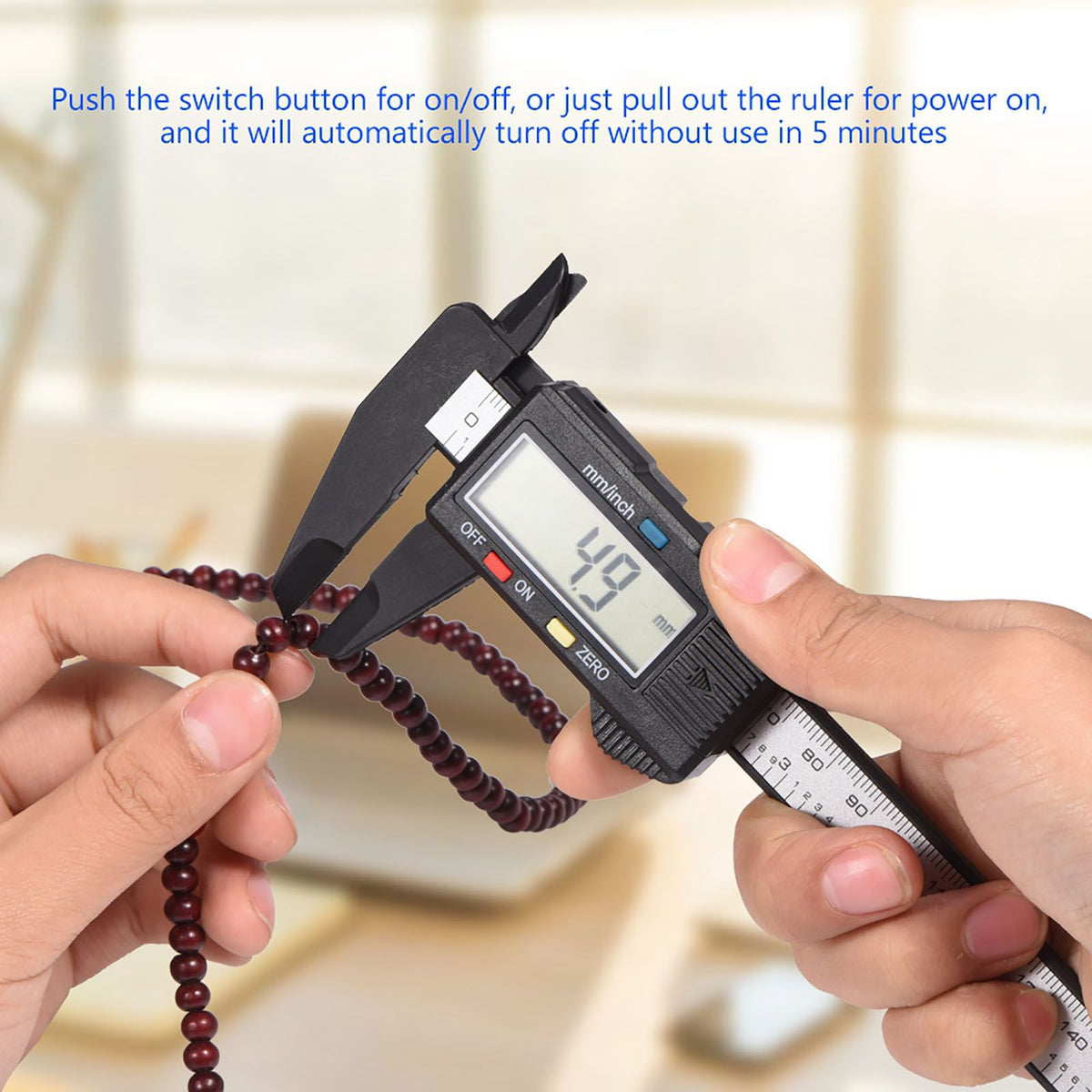 Digital caliper with large LCD screen for precise inside, outside, and depth measurements, black color, ideal for safety gate adjustments.