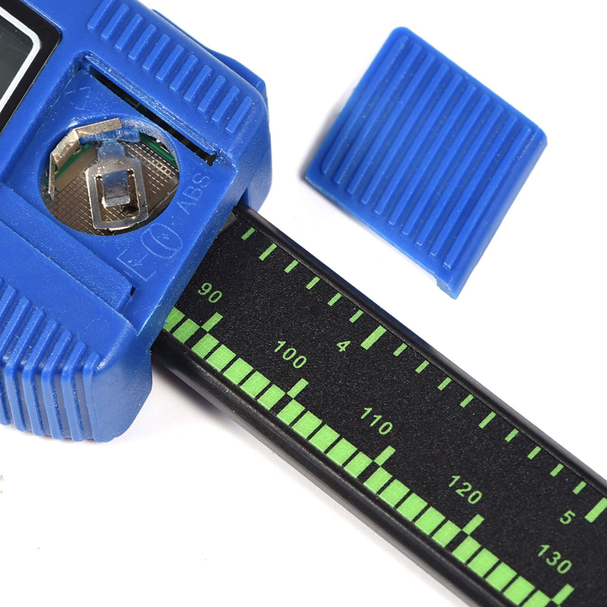Blue digital caliper with large LCD screen, used for precise inside, outside, and depth measurements in safety gate installation.