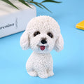 White simulation shaking head dog bobble head toy for car interior dashboard decor, designed for kids' ride-on cars.