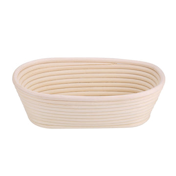 Handmade unbleached natural cane banneton proofing basket for bread dough, 25x14.5x8cm, used for bread baking and proofing.