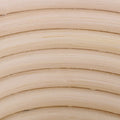 Handmade unbleached natural cane banneton proofing basket for bread dough, 25x14.5x8cm, used in bread baking.