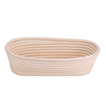 Handmade unbleached natural cane banneton proofing basket for bread dough, 27.5x14x8cm, with woven texture and round shape.