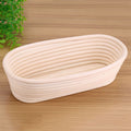 Handmade unbleached natural cane banneton proofing basket for bread dough, 27.5x14x8cm, used in bread baking.