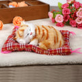 Yellow plush sleeping kitten toy with sound, perfect for kids' pretend play and Christmas gift, by Everything Baby.