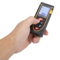 Handheld digital laser distance meter from Everything Baby measuring up to 40m, used for precise length and volume measurements.