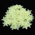Set of 100 glow-in-the-dark star stickers for nursery walls, perfect for baby and kids' pretend play decor.
