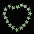 Set of 100 glow-in-the-dark 3D star stickers for nursery walls, perfect for kids' pretend play and decorating bedrooms.