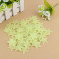 Set of 100 glow-in-the-dark star stickers for nursery walls, perfect for kids' pretend play and decorating bedrooms.
