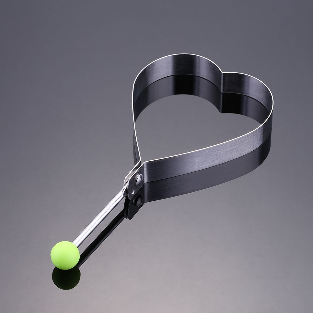 Stainless steel fried egg mold and pancake shaper from Everything Baby, with round ring for shaping eggs and pancakes.