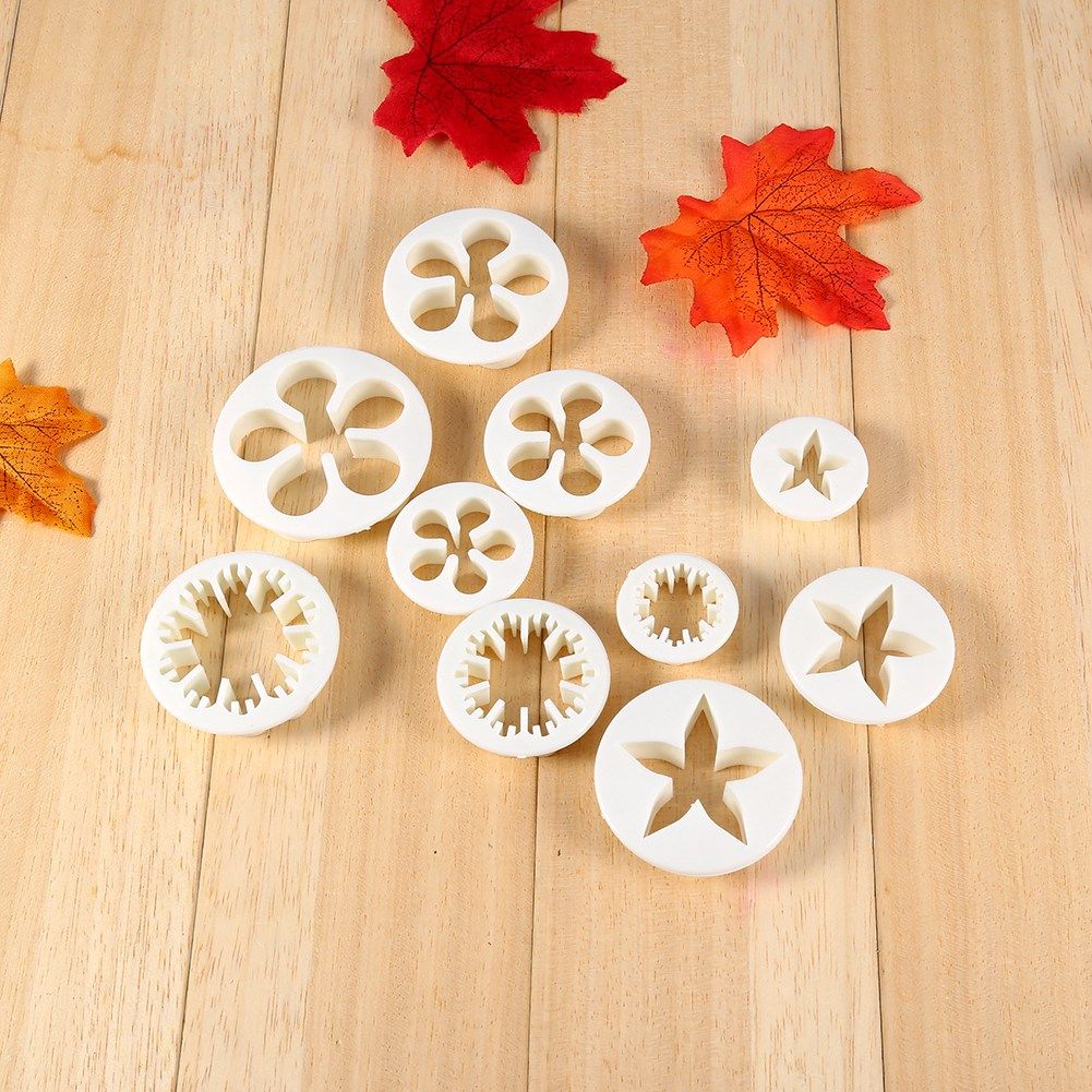 Set of 46 flower fondant cake decorating tools and cutters for sugarcraft, ideal for cake decorating and sugar art projects.