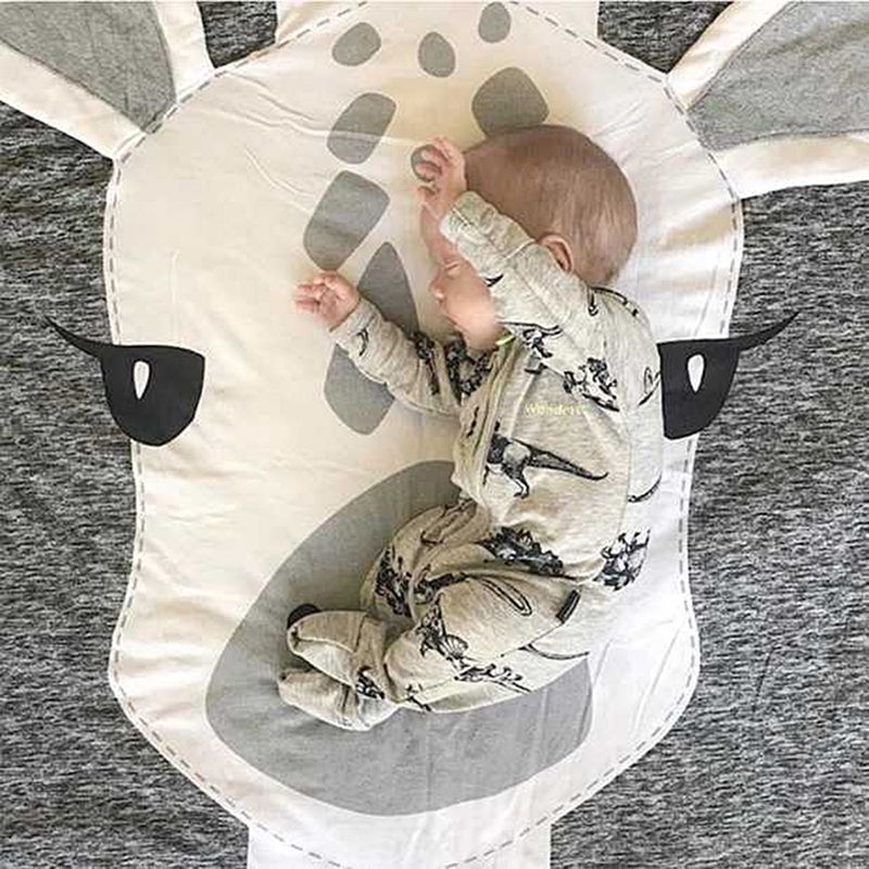 Cute cartoon animal baby play mat made of cotton, perfect for crawling and pretend play for children by Everything Baby.