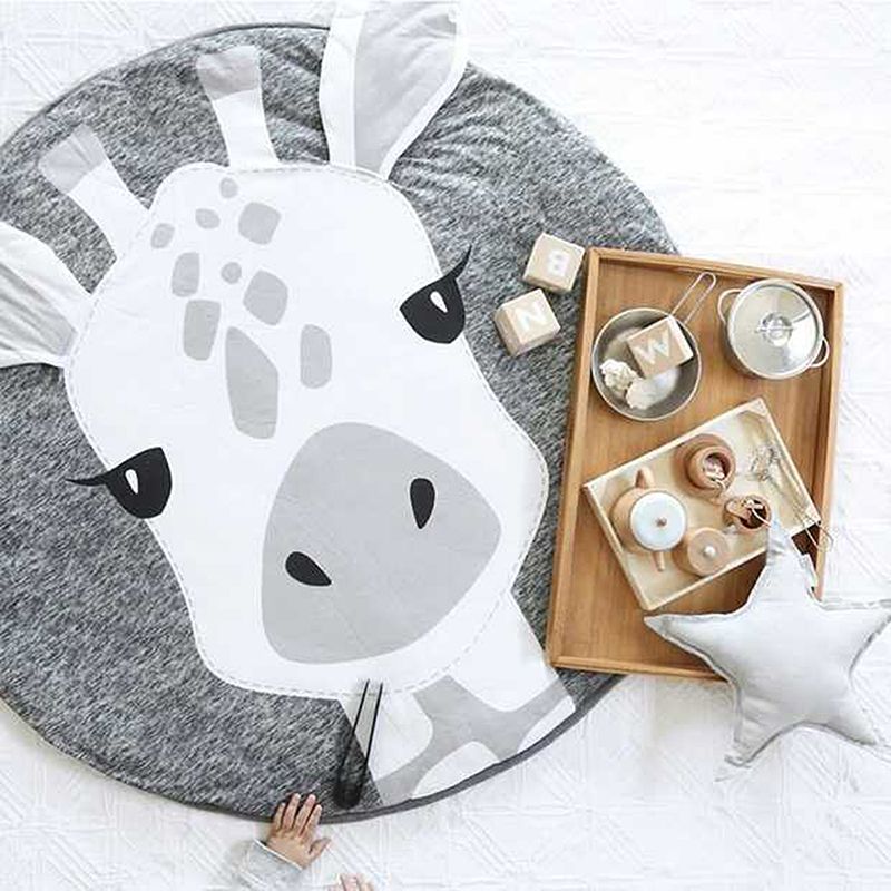 Cute cartoon animal play mat for babies and children, made of cotton, ideal for crawling and pretend play by Everything Baby.