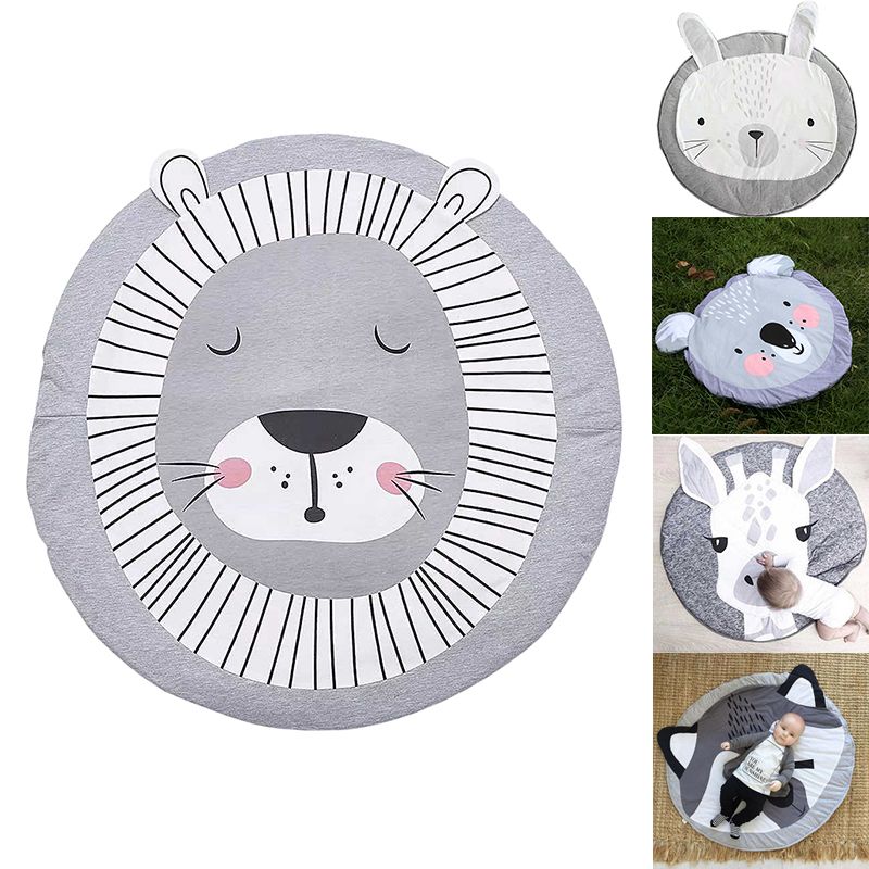 Colorful baby play mat featuring cute cartoon animal designs, made of soft cotton for crawling and pretend play.