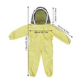 Child in beige beekeeping protective suit with hood and gloves, standing outdoors in a garden setting.