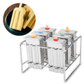 Stainless steel ice pop mold by Everything Baby, used for making homemade ice cream treats in a modern kitchen setting.