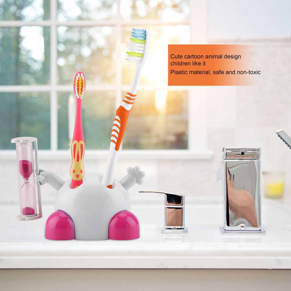 Pink children's toothbrush holder with hourglass timer for 3-minute countdown, part of baby and kids grooming kits.