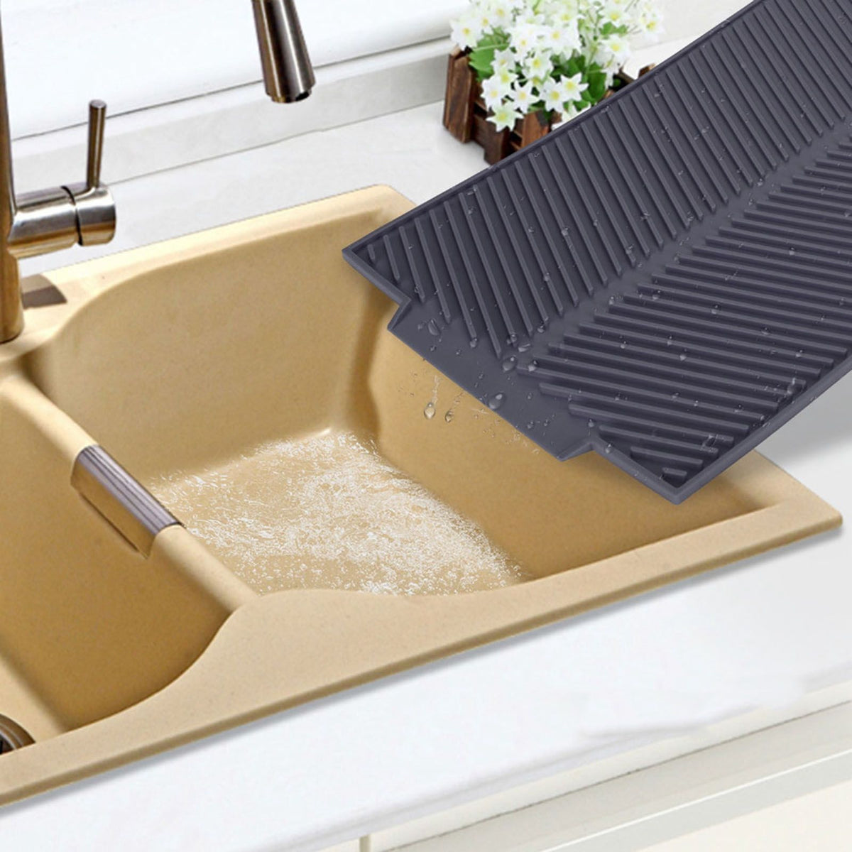 Grey rectangle silicone drain mat for drying dishes, heat resistant and slip-proof tray from Everything Baby for nursing and feeding.
