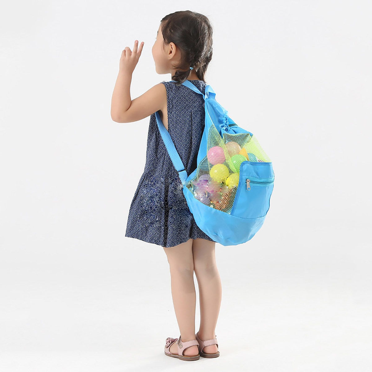 Blue mesh drawstring backpack for kids, perfect for outdoor beach toy storage and play, by Everything Baby.