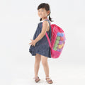 Pink mesh drawstring backpack for kids with shell toy storage, ideal for outdoor play and beach trips, by Everything Baby.