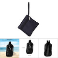 Black mesh drawstring backpack for kids by Everything Baby, ideal for outdoor play and toy storage during beach outings.