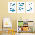 Three-piece canvas wall art featuring cartoon fish prints, perfect for kids' room or home decor by Everything Baby.