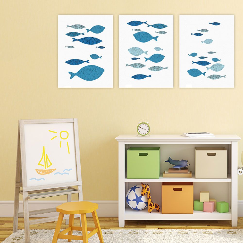 Three-piece canvas wall art featuring cartoon fish prints, perfect for kids' room or home decor by Everything Baby.