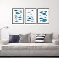 Three-piece canvas wall art featuring colorful cartoon fish prints, perfect for baby's nursery or kids' room decor.