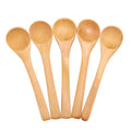 Set of 30 mini natural wooden children's spoons from Everything Baby, ideal for kids' outdoor play and pretend kitchen activities.