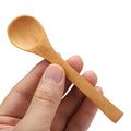 Set of 30 mini natural wooden children's spoons, ideal for play and kitchen use, by Everything Baby.