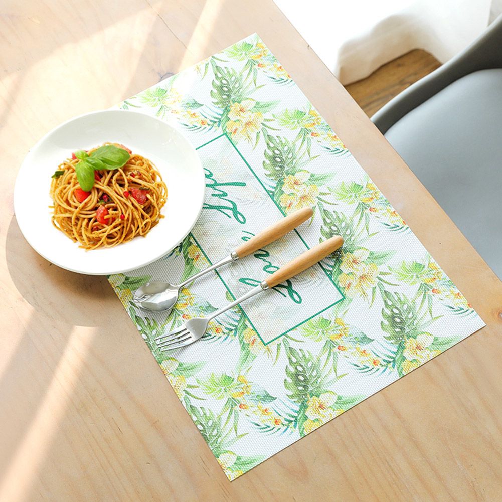 Colorful non-slip PVC placemat for kids' dining table, featuring a rectangular shape and playful design by Everything Baby.