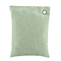 Light green air purifying bag with activated charcoal for odor removal, designed for cars and kids' spaces by Everything Baby.