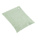 Light green bamboo air purifying bag with activated charcoal for odor removal, designed for kids' lunch boxes and car deodorizer.