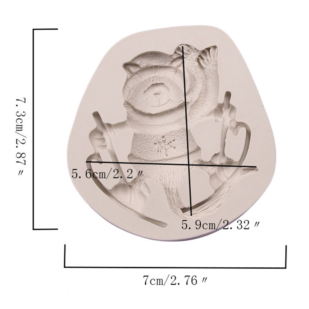 Silicone cake mold featuring Christmas deer, pine cone, and bear designs for DIY holiday treats, ideal for kids' baking projects.