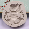 Silicone cake mold featuring Christmas-themed deer, pine cone, and bear designs for DIY baking, by Everything Baby