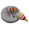 Silicone mold with hot air balloon pattern for fondant cake decorating, designed for baking and cake decoration.