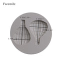 Silicone mold with hot air balloon pattern for fondant cake decoration, suitable for baking and cake decorating projects.