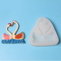 Silicone cake mold featuring a sweet couple swan pattern for desserts and baking, ideal for DIY cake decoration and creative baking.