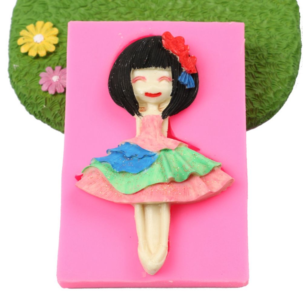 Silicone cake mold featuring a ballet dancing girl pattern, ideal for baking desserts, puddings, or soap making for kids' pretend play.