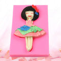Silicone cake mold featuring a ballet dancing girl pattern for baking desserts and making soap, suitable for kids' pretend play.