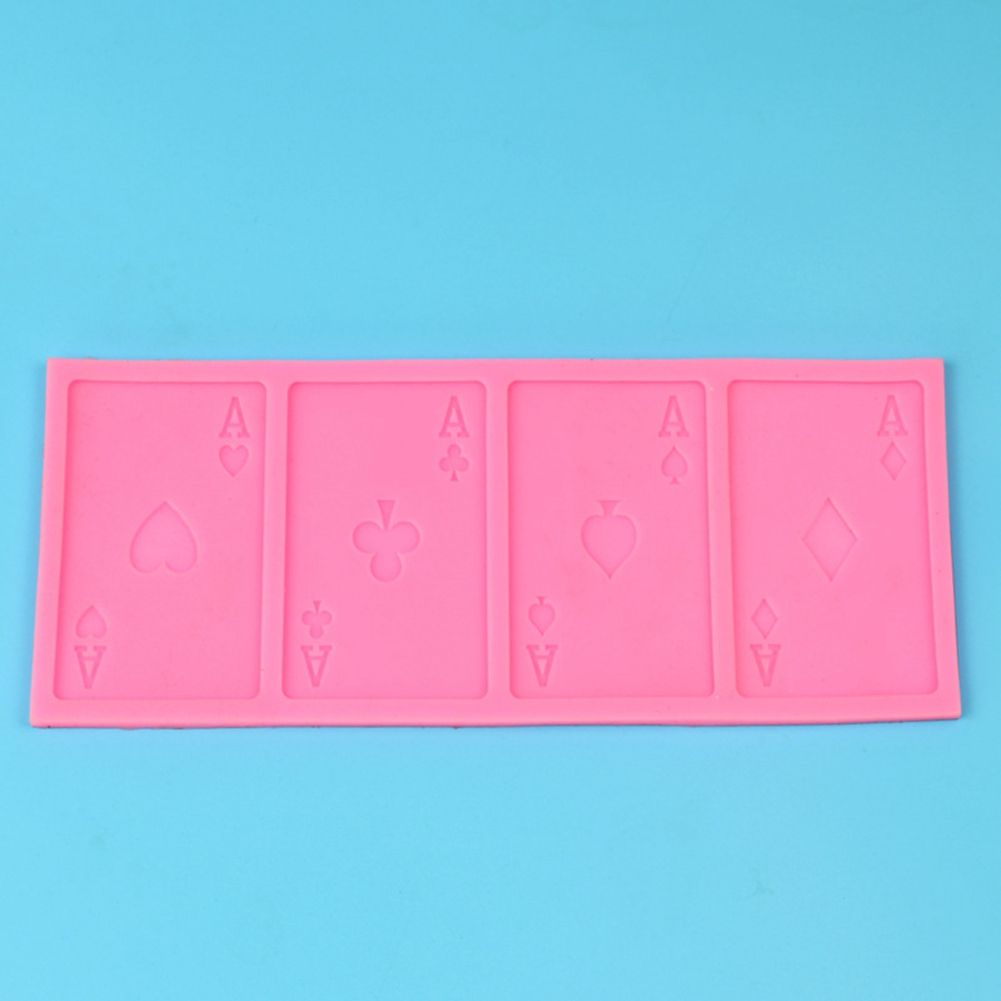 Silicone mold in poker shape for cake decorating, featuring chocolate and sugar paste, ideal for baking and pretend play.