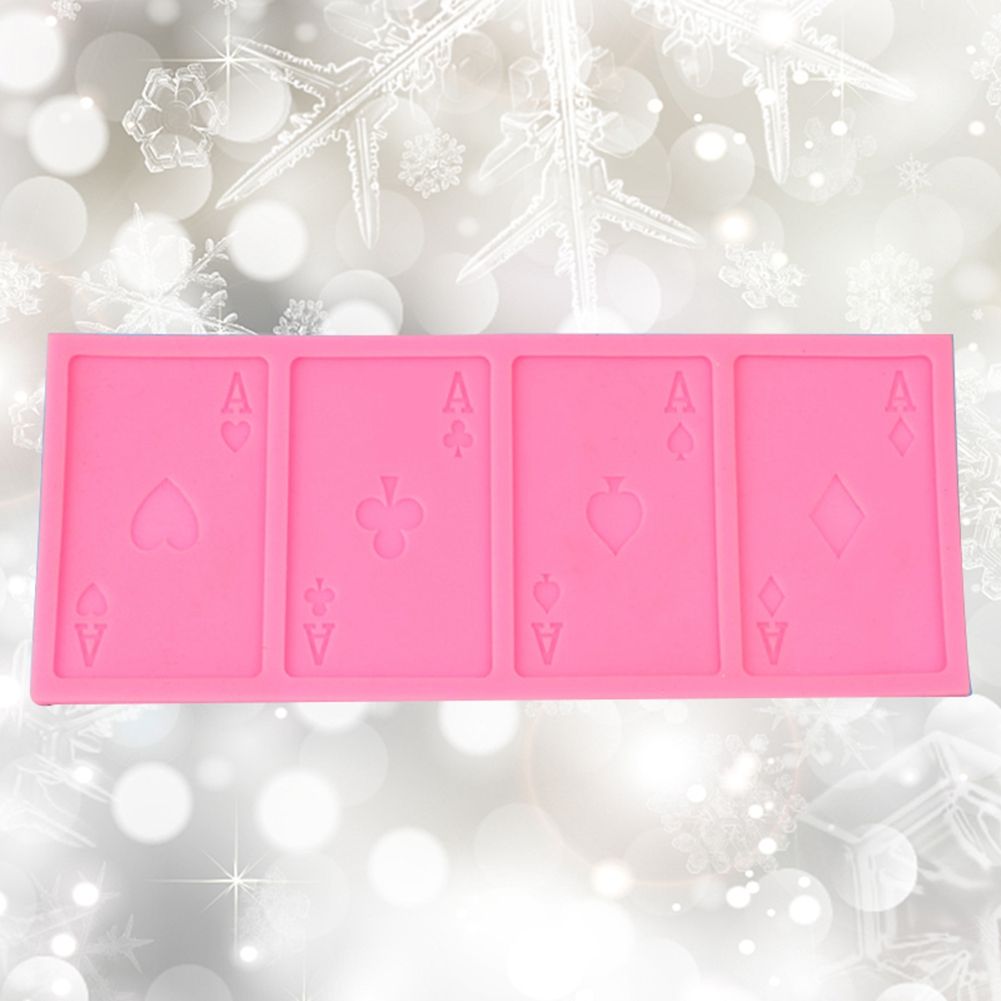 Silicone mold with poker shape design for cake decorating and baking, ideal for creating fun treats for kids' pretend play.