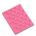 Silicone mold with heart-shaped letters for cake decorating and sugar paste, ideal for baking and crafting desserts.