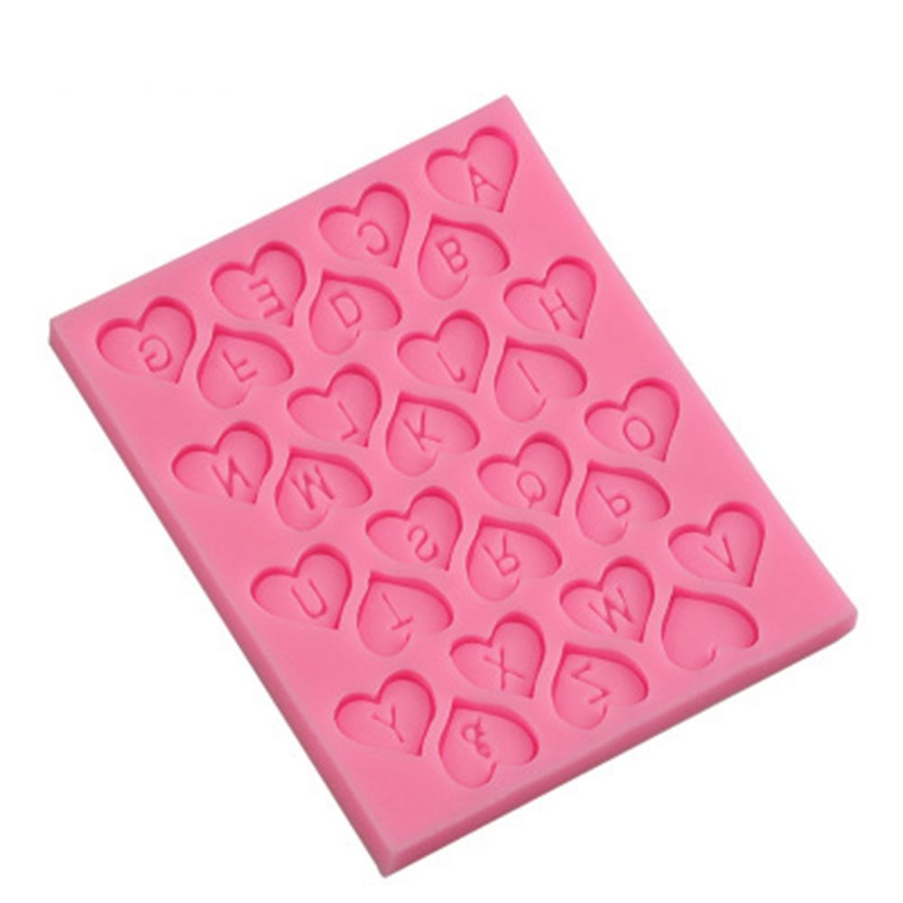 Silicone mold with heart-shaped letters for cake decorating and sugar paste, ideal for baking and crafting desserts.