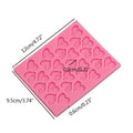 Heart-shaped silicone mold for cake baking and cookie decorating, ideal for creating chocolates and sugar paste decorations.