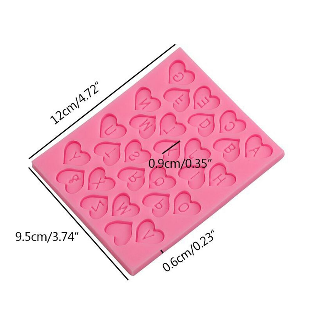 Heart-shaped silicone mold for cake baking and cookie decorating, ideal for creating chocolates and sugar paste decorations.